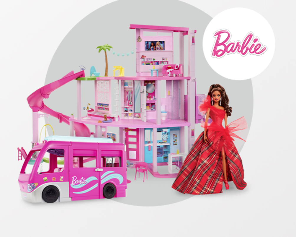 Barbie's cozy holiday home adorned with a sparkling Christmas tree and a colorful bus in the front yard.