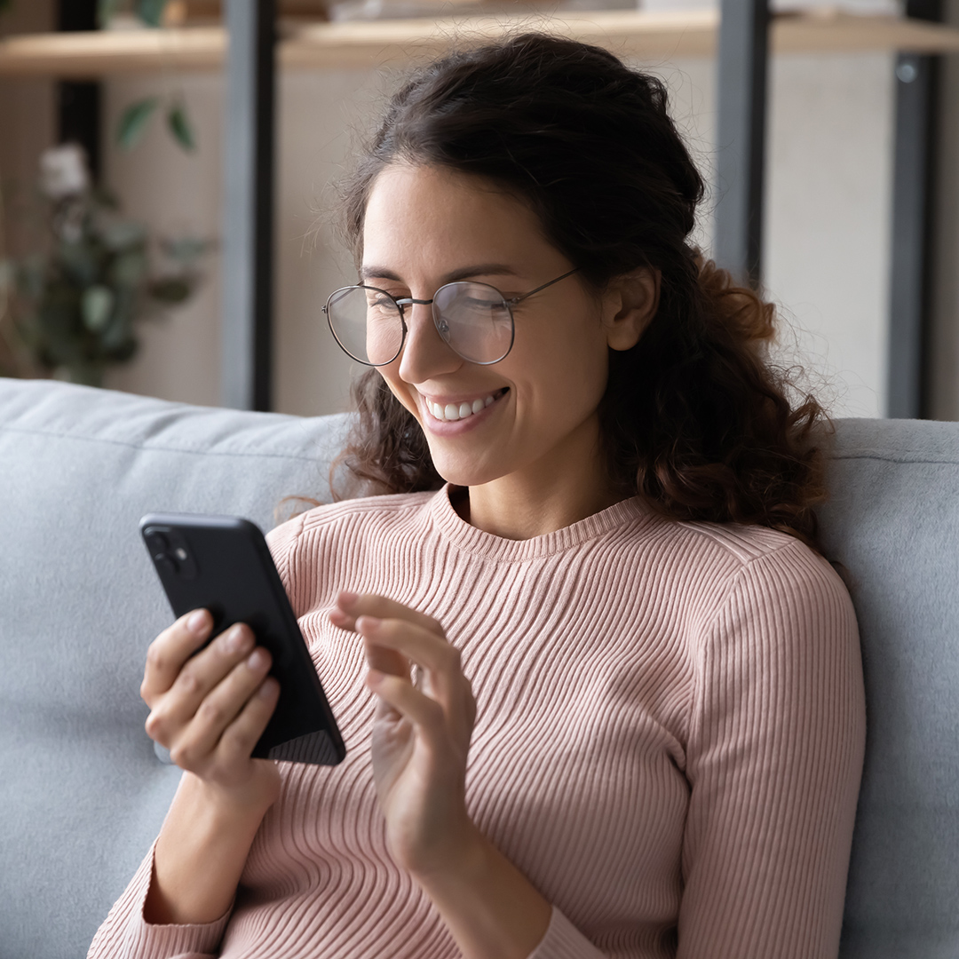 woman looking at her phone